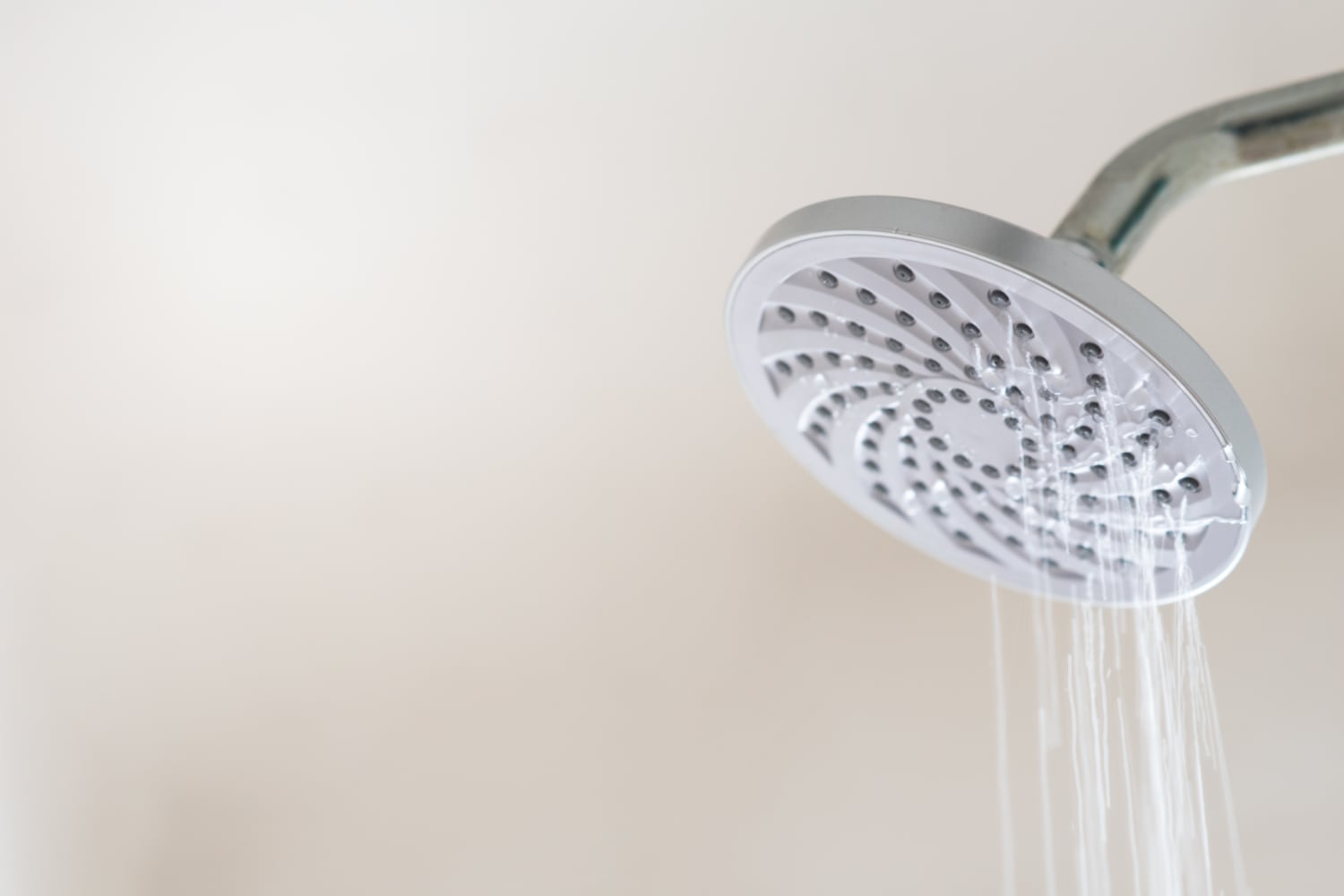 water slowing coming out of a shower head